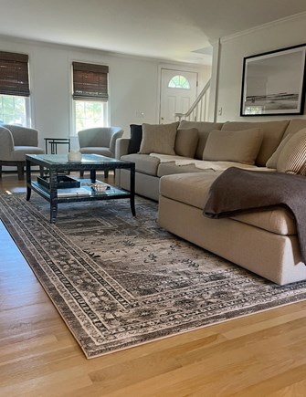 Falmouth Cape Cod vacation rental - Living room with TV and fireplace