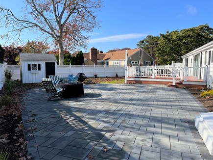 Yarmouth Cape Cod vacation rental - New Backyard patio with newly installed natural gas fire pit.