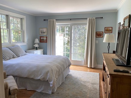 Eastham Cape Cod vacation rental - Third bedroom (queen bed) with deck access and outdoor shower.