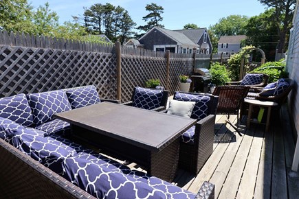 Dennis Port Cape Cod vacation rental - Alternate view of seating outside in rear and side<br/>