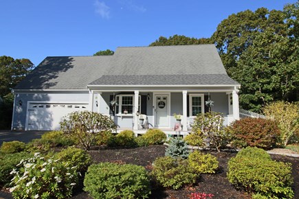 East Dennis Cape Cod vacation rental - Set back from road with turnaround driveway & ample parking