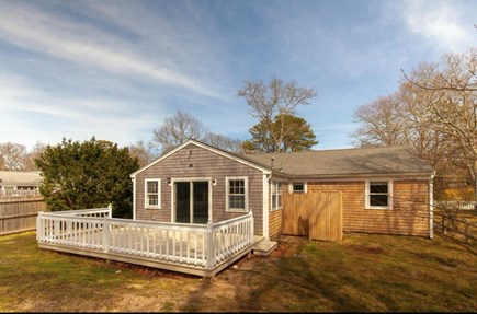 South Yarmouth Cape Cod vacation rental - Backyard with expansive deck