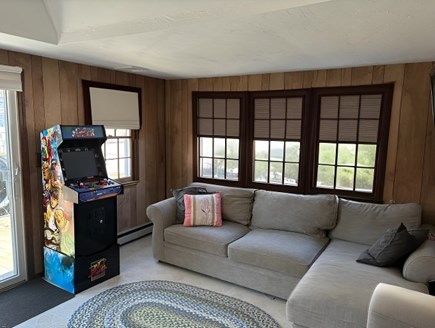 South Yarmouth Cape Cod vacation rental - Sun room with pull out couch and access to back deck; TV & Arcade