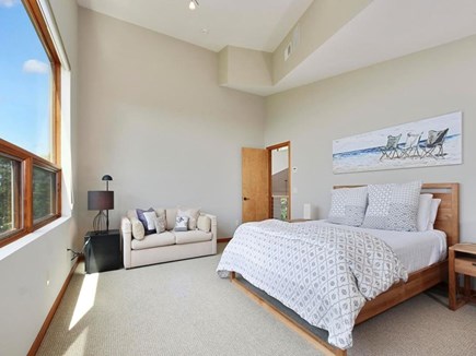 Falmouth Cape Cod vacation rental - Upstairs bedroom with queen bed, ocean view, and attached deck