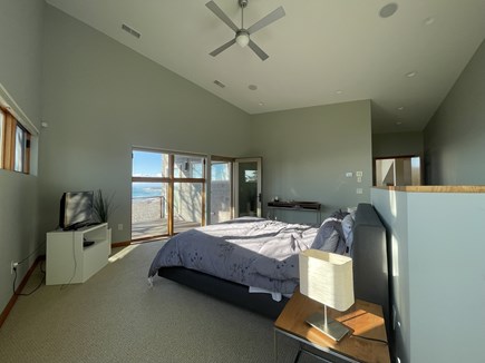 Falmouth Cape Cod vacation rental - Master bedroom with king bed, ocean view, and private deck