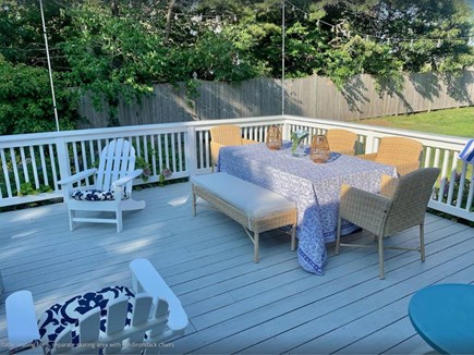 Chatham Cape Cod vacation rental - Furnished Back Porch - Table, 6 Wicker Seats, 4 Adirondack Chairs