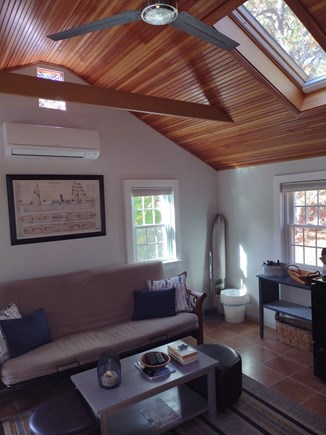 Wellfleet Cape Cod vacation rental - Great room with high ceiling fan & skylight. Couch/futon.