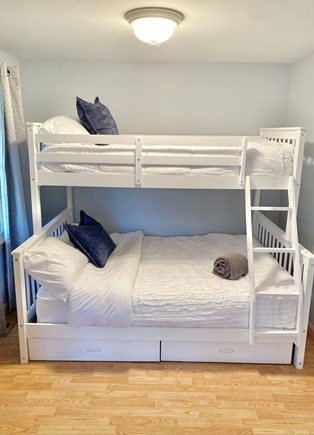 South Yarmouth  Cape Cod vacation rental - Kids bunk beds, full on bottom, twin on top. Delta mini crib.