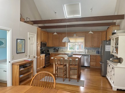 Chatham Cape Cod vacation rental - Huge kitchen, high ceiling, island, table (6-8) 1/2 bath, laundry