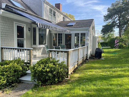 Chatham Cape Cod vacation rental - Back deck and yard leading to upper lawn.