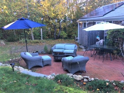 East Dennis Cape Cod vacation rental - Private Back Yard Patio with Furniture and some lighting