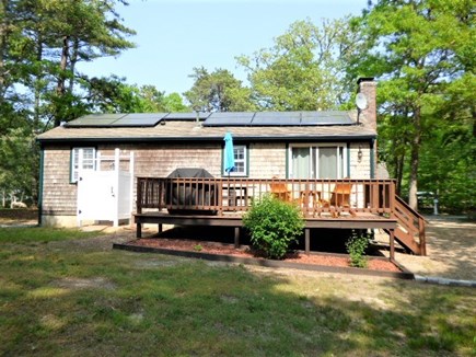 Brewster Cape Cod vacation rental - Deck looks over a large private back yard