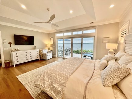 Mashpee Cape Cod vacation rental - Main King bedroom with tv, sliders to patio, gorgeous views, bath