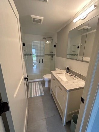 Dennis Cape Cod vacation rental - First Floor full bathroom with walk-in shower.
