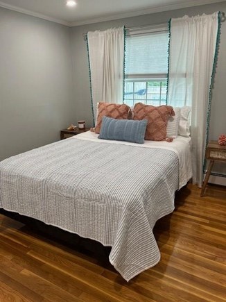 Dennis Cape Cod vacation rental - Queen Bedroom #1 with full closet and extra shelving.