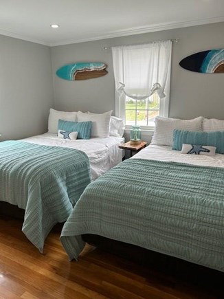 Dennis Cape Cod vacation rental - Surfboard Room with 2 Queen Beds, full closet, cubby storage.