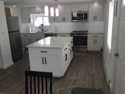 Provincetown Cape Cod vacation rental - Kitchen with all new appliances, large island, LED lighting,