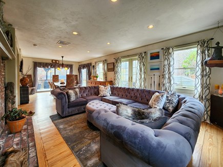 Eastham Cape Cod vacation rental - Large open living room and dining room with sliders to deck