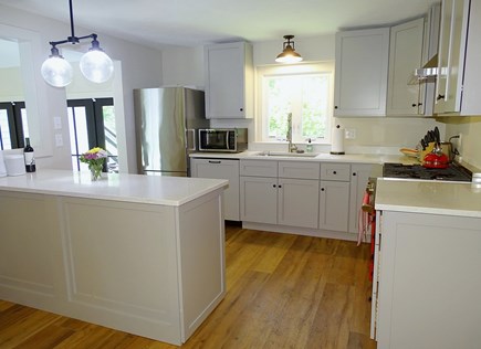 East Falmouth Cape Cod vacation rental - Fully stocked kitchen, opens to sun room