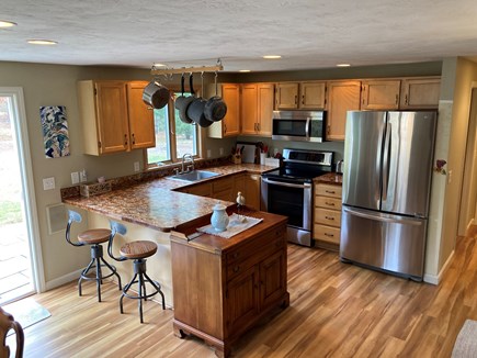 Harwich Cape Cod vacation rental - Kitchen with Breakfast Bar and Stainless Steal Appliances.