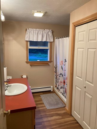 Harwich Cape Cod vacation rental - First floor bathroom with step in shower