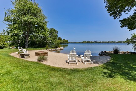 Centerville, Wequaquet Lake Waterfront Cape Cod vacation rental - Sprawling grassy yard great for outdoor games a lakefront dream.