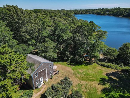 Orleans Cape Cod vacation rental - Aerial view of house, lawn, Crystal Lake, & SE to Atlantic Ocean