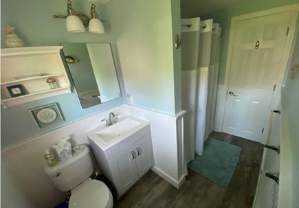 Orleans Cape Cod vacation rental - Upstairs full bathroom with tub, shower, fan, & baseboard heater
