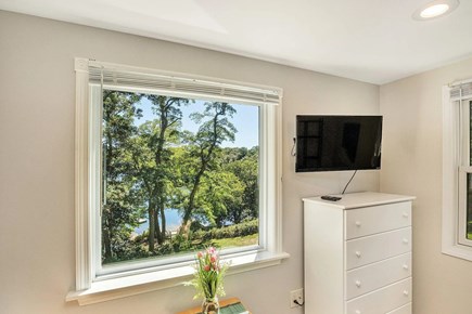 Orleans Cape Cod vacation rental - Queen bedroom facing Crystal Lake across large lawn