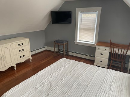 South Yarmouth Cape Cod vacation rental - Master bedroom- dresser, television, small work space