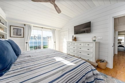 West Dennis Cape Cod vacation rental - Master Bedroom with slider to deck and outdoor shower.