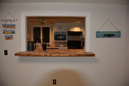 Yarmouth Cape Cod vacation rental - A view from living room to the kitchen through the bar