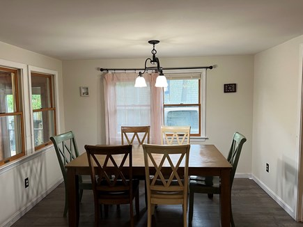 Yarmouth Cape Cod vacation rental - Dinning room with a 6-person table and chairs set