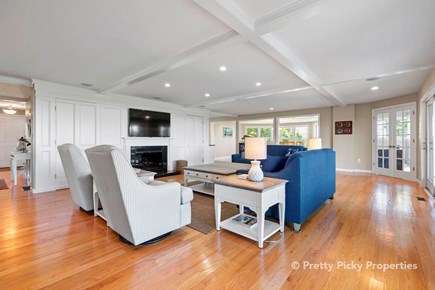 East Orleans Cape Cod vacation rental - Primary living room, only one of severallounge areas with TVs