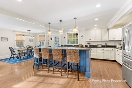 Brewster Cape Cod vacation rental - Striking use of color in the kitchen and common space.