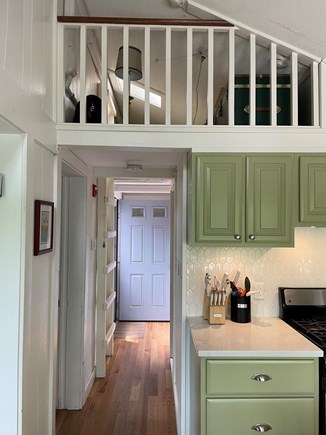 New Seabury, Popponesset Cape Cod vacation rental - Main hallway with a ladder to the loft