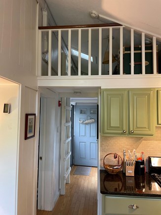 Mashpee Cape Cod vacation rental - Main hallway with a ladder to the loft