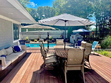 New Seabury Cape Cod vacation rental - Deck area with large teak table and plenty of seating