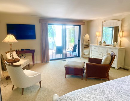 New Seabury Cape Cod vacation rental - Master bedroom sitting area with slider to deck