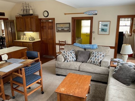 Harwichport Cape Cod vacation rental - Open concept family room and kitchen, with laundry and half bath.