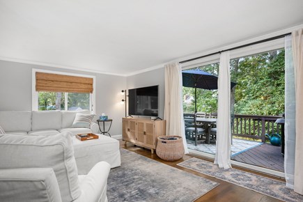 Harwich Cape Cod vacation rental - Nearby living room offers easy access to the deck and a comfortable space within which you can gather together to watch your favorite content