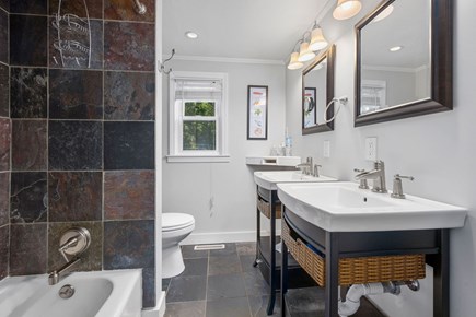 Harwich Cape Cod vacation rental - Bathroom #1 is a full bathroom with tub/shower combination and is located in the hallway of the upper level (this bathroom is shared by Bedrooms 1 and