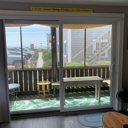 Provincetown Cape Cod vacation rental - Living Room/Deck. Beautiful outside screened deck, view of ocean.