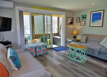 Provincetown Cape Cod vacation rental - Living with TV, and slider to deck with ocean views