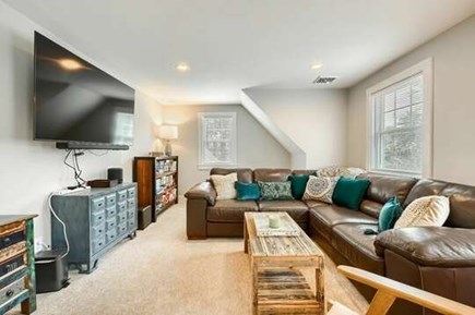 Chatham Cape Cod vacation rental - Second floor loft entertainment room- game table, large sectional