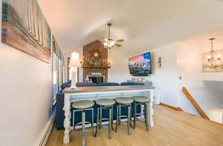 Sandwich Cape Cod vacation rental - Bar seating behind couch- 72 Town Neck Road Town Neck Beach Escape
