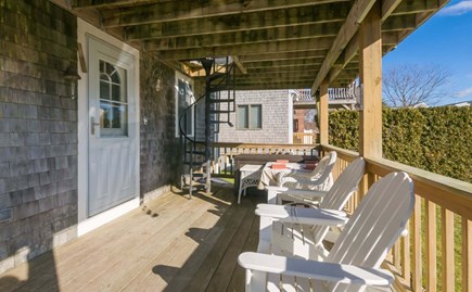 Sandwich Cape Cod vacation rental - Lower level deck with outdoor seating- 72 Town Neck Road Town Neck Beach Escape
