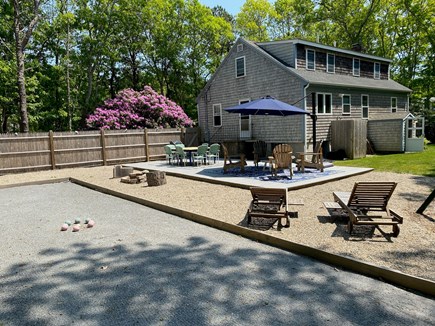 Falmouth Cape Cod vacation rental - Outdoor lounging area with swing set and bocce court