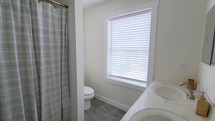 Wellfleet Cape Cod vacation rental - Second floor bathroom with shower and two sinks