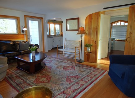 Bourne, Cataumet Cape Cod vacation rental - Living room leading to back deck and kitchen